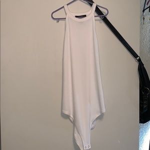Woman’s high neck bodysuit.